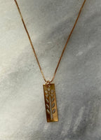 Gold Cutout Flower Bar Necklace